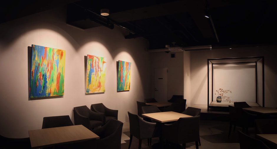 ASUKA SAKASHITA artworks displayed in a restaurant