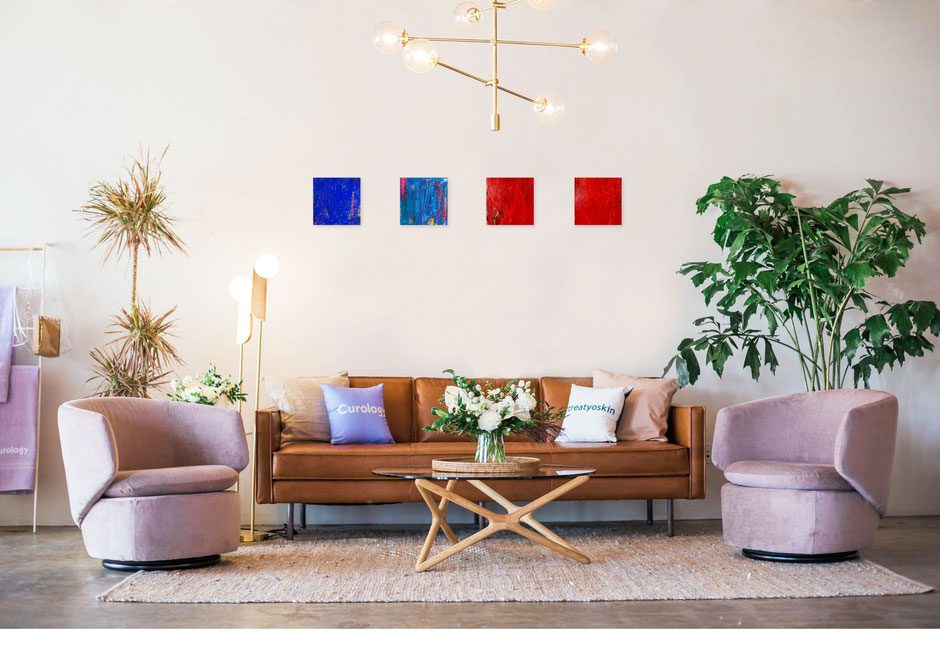 ASUKA SAKASHITA artworks displayed in a living room