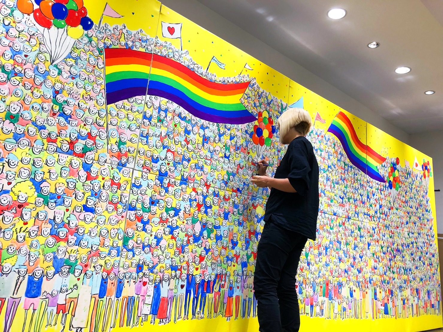 ASUKA SAKASHITA creating the exhibition artwork at Shinjuku Marui Men